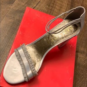 Brand new- silver heels!